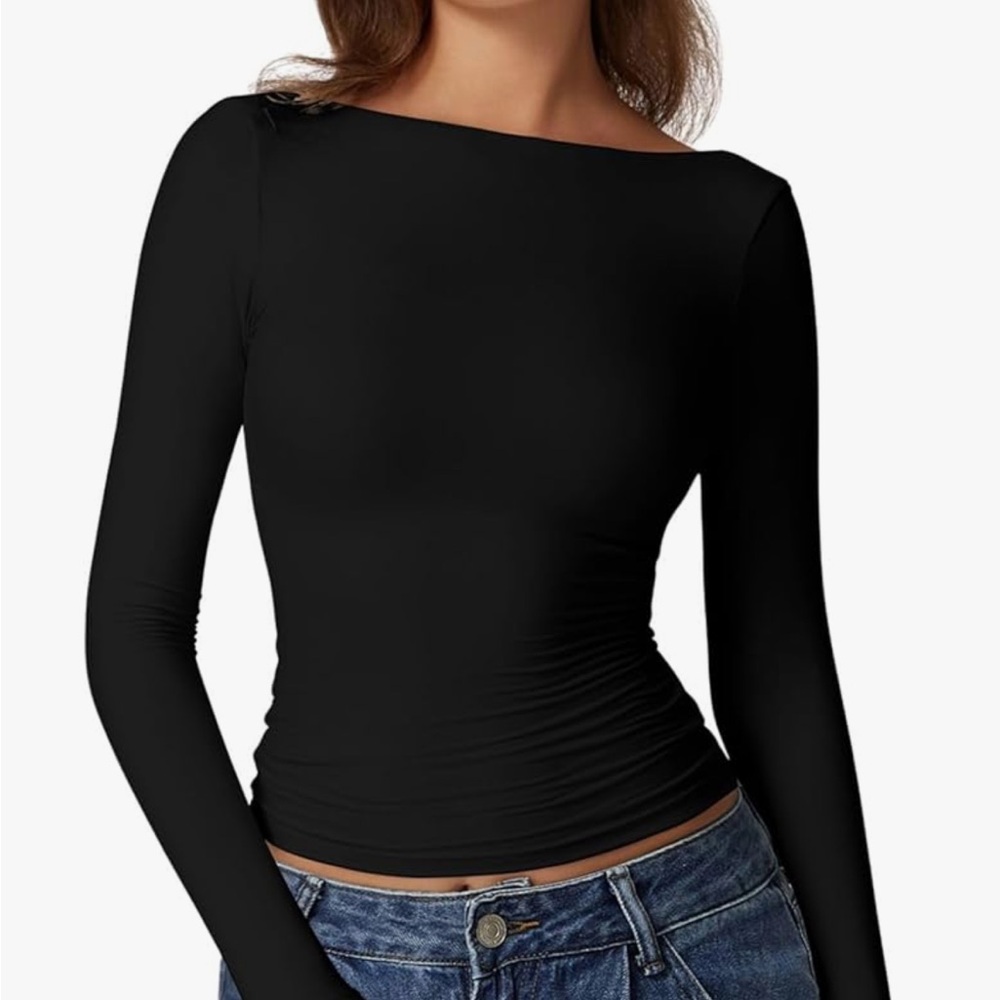 Low back long sleeve open back top New in bag